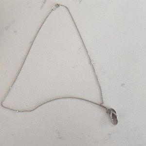 Na Hoku gold with diamonds slipper necklace.